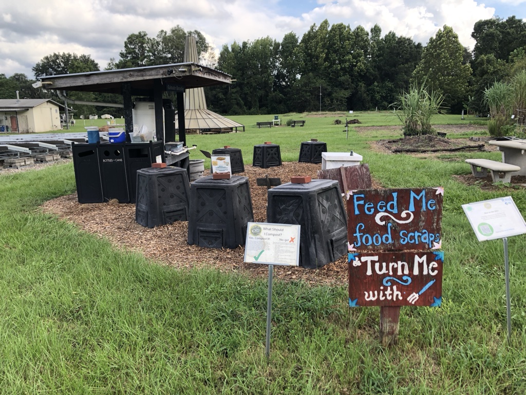 Compost station with research plots in background