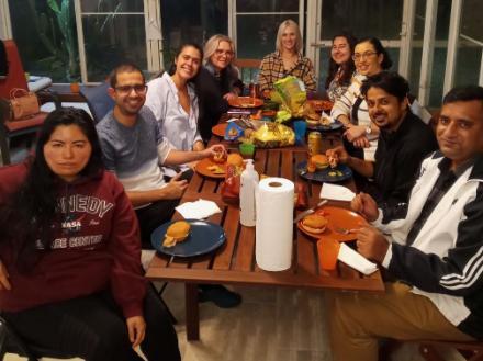 Lab personnel Fall 2023 seated around table for a meal.