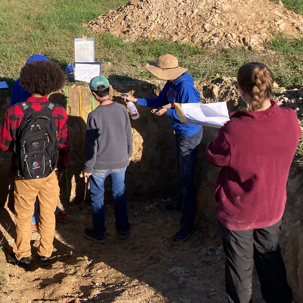 The UF Soils Judging Team practices before the 2024 SE Regional Contest