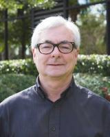 An headshot image of Dr. Andrew Ogram, professor emeritus