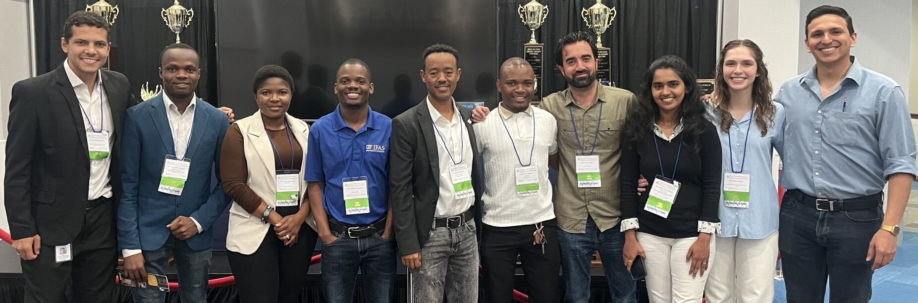 A group of University of Florida scientists stand in a line after serving as judges for the State Science and Engineering Fair of Florida.